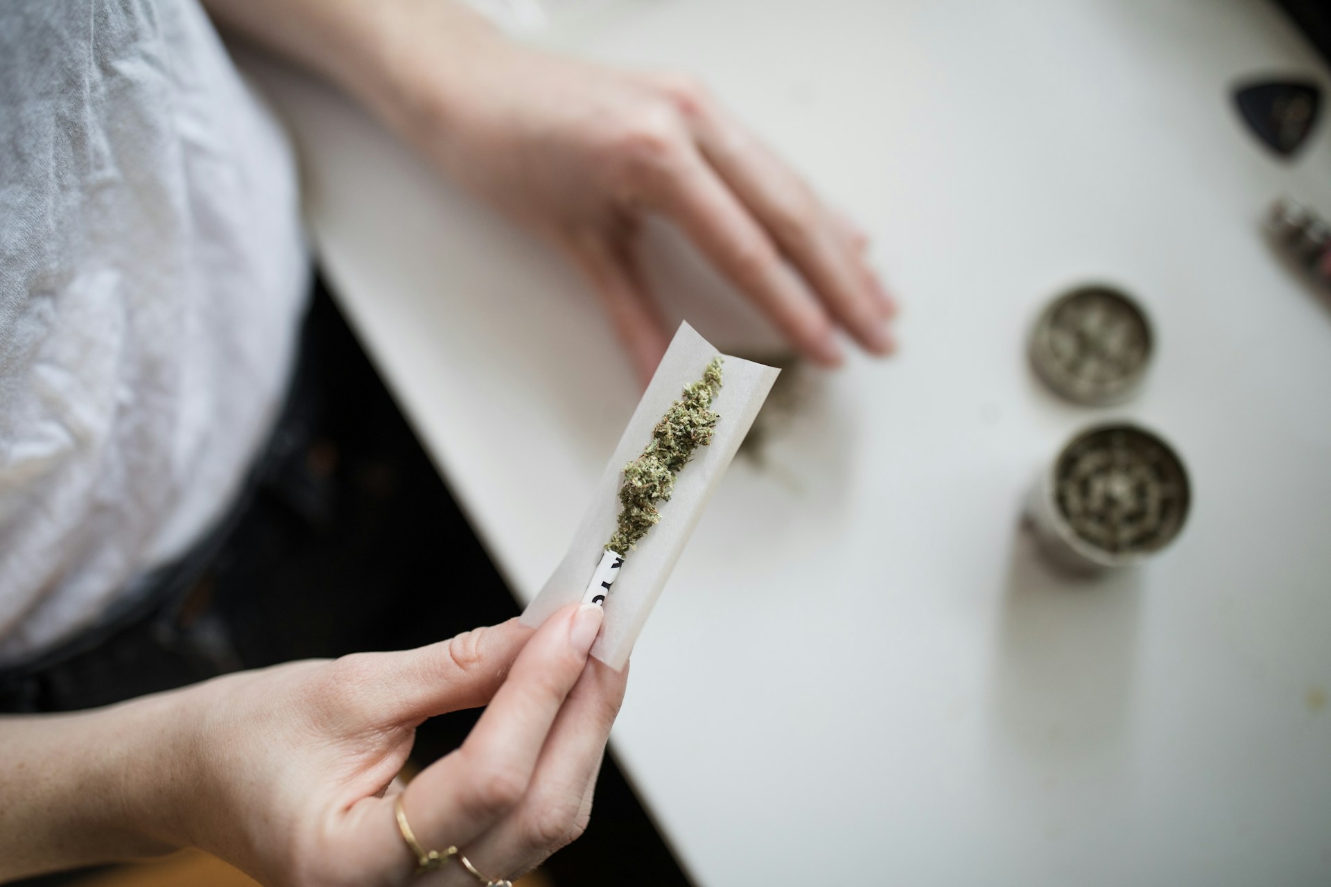 Marijuana user rolling a joint